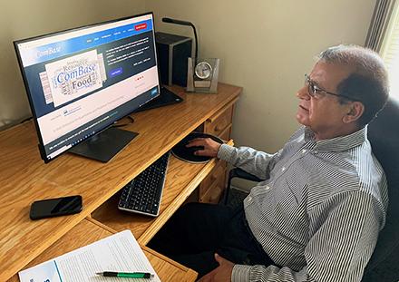 ARS microbiologist, Vijay Juneja at his computer reviewing ComBase.