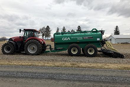 A tractor applying manure
