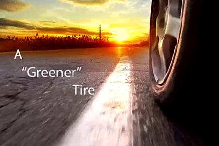 The text "A 'Greener' Tire" appears over an image of an upright tire on a road.